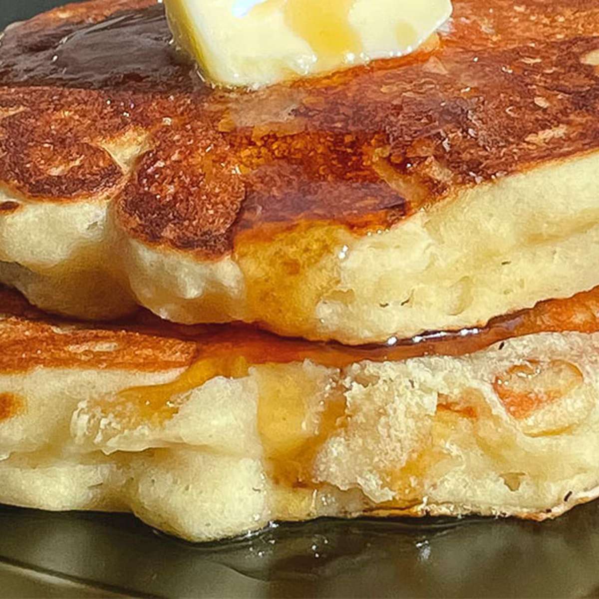 Golden Brown Griddle Cakes with Two Eggs Any Style