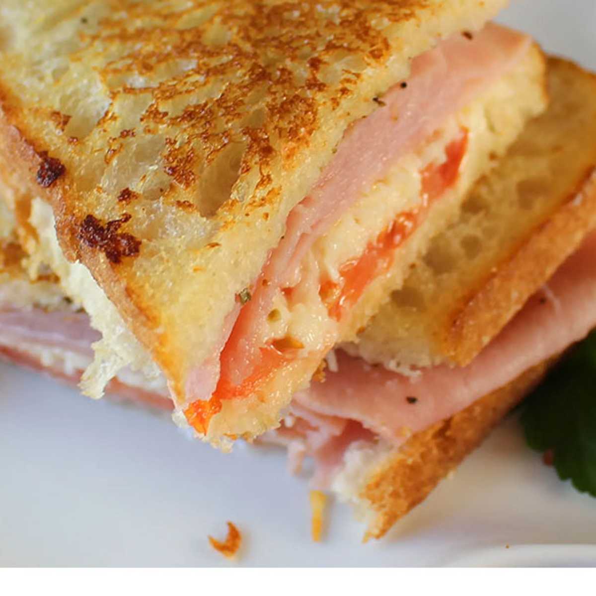 Grilled Swiss Cheese with Bacon, Ham and Tomato