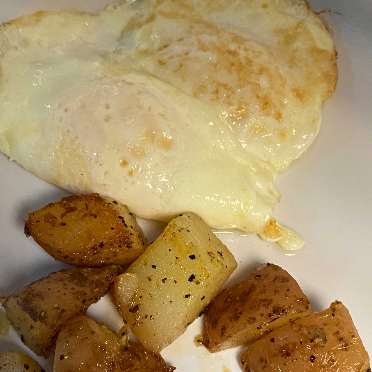 2 Eggs, Potatoes or Grits with Choice of Bread