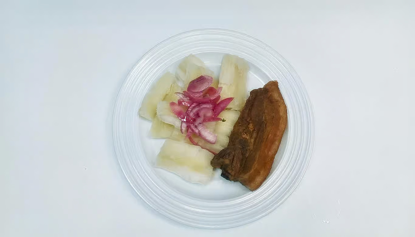 Yuca con Chicharron de Cerdo/Boiled Cassava w Chrunchy pork