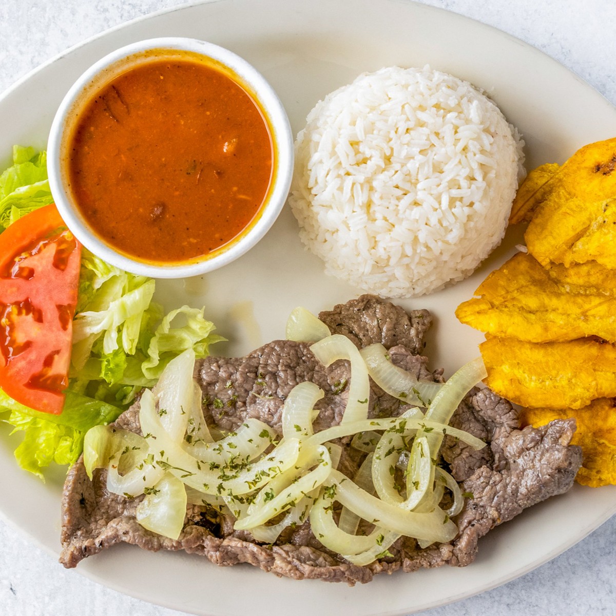 Bistec Encebollado (8 oz) / Grill Steak Sauteed (8 oz)