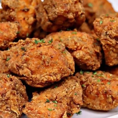 Crispy Salmon Bites served with 2 sides, honey cornbread & Beverage!