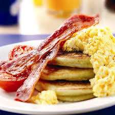 74. 2 Eggs & Pancakes with Bacon/Sausage