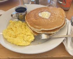 73. 2 Eggs & Pancakes (Any Style Egg)