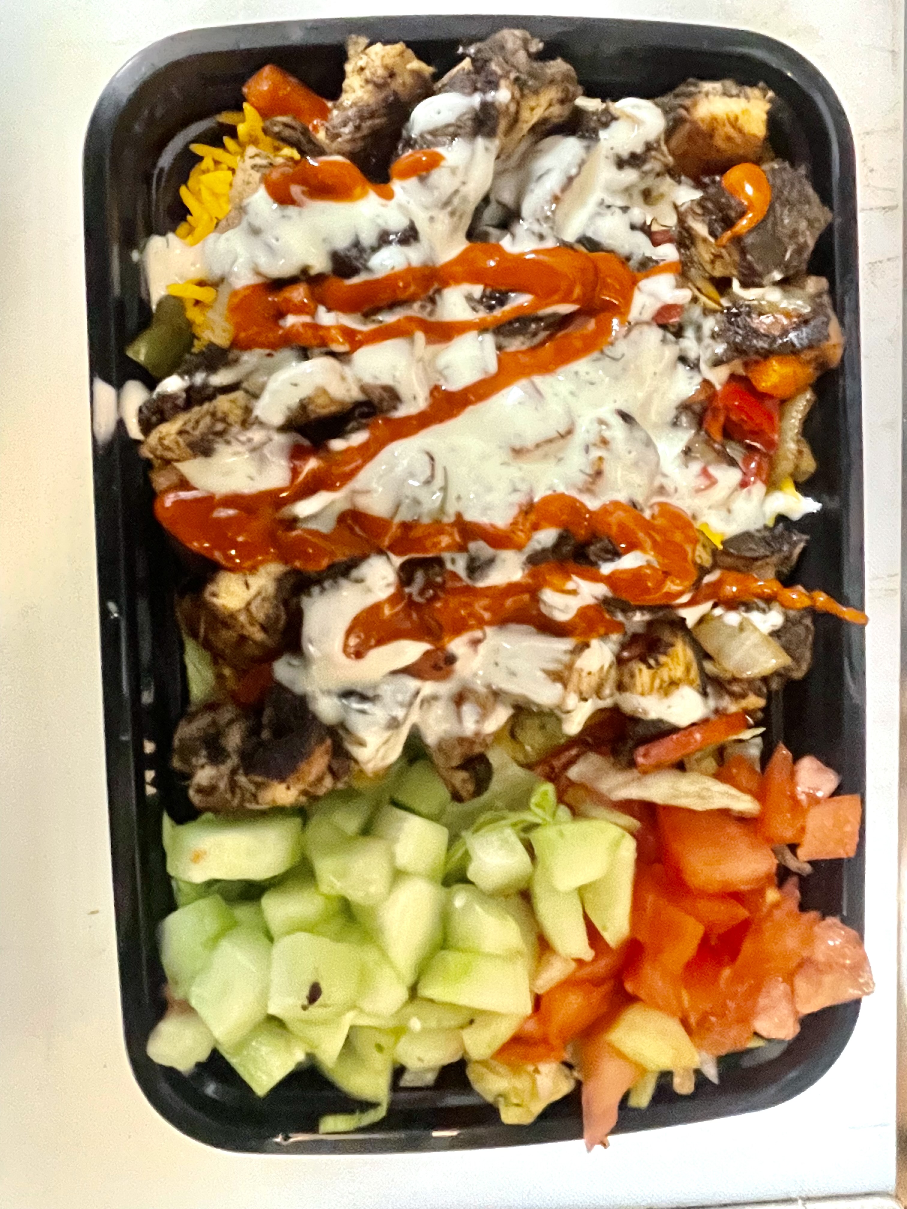 JERK CHICKEN OVER RICE AND SALAD