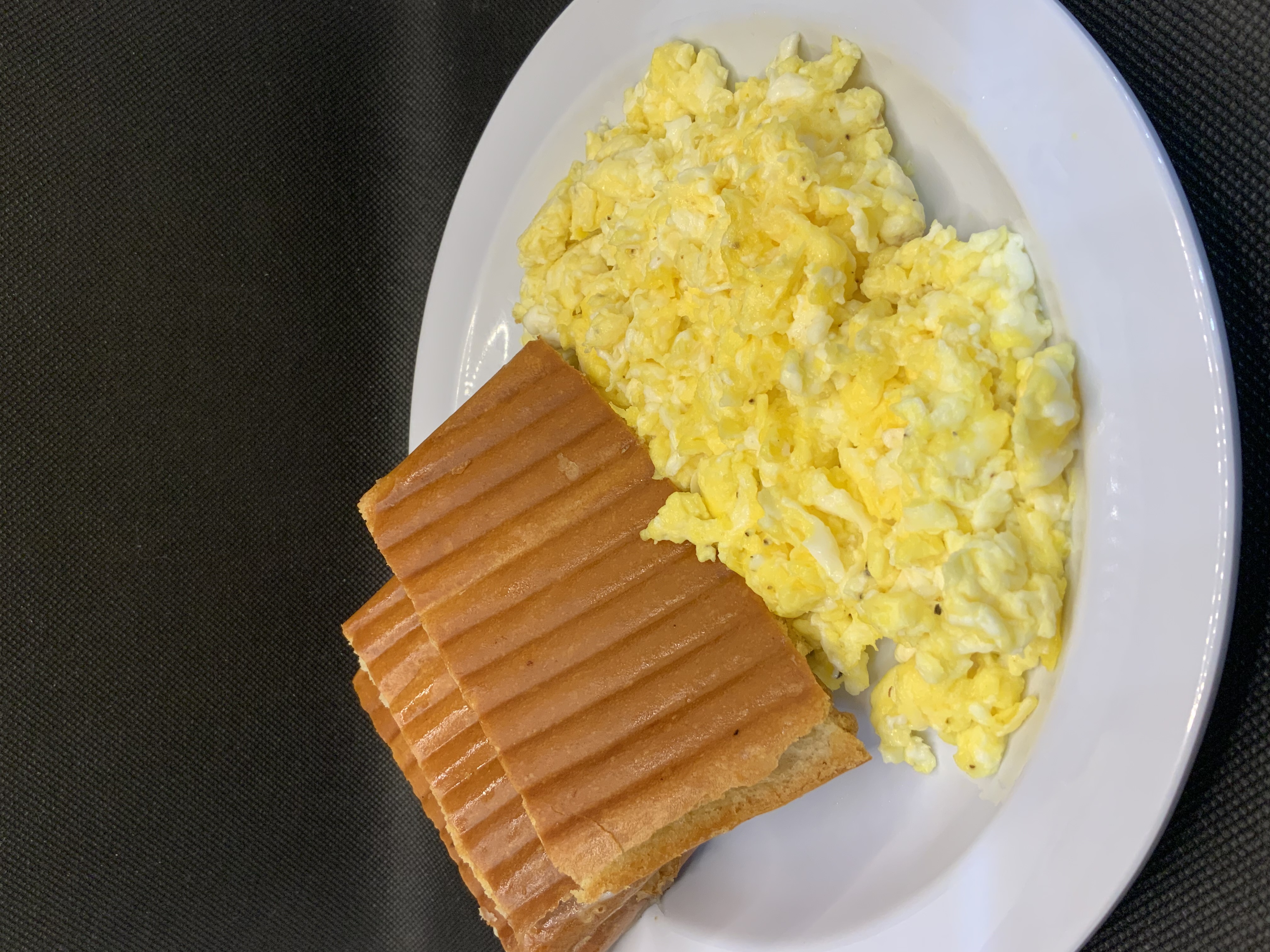 Toast w/ Butter and Scrambled or Fried Eggs