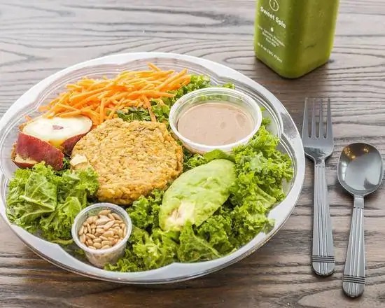 Kale veggie burger salad with balsamic dressing