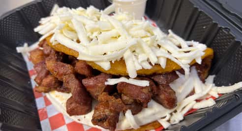Cachapa Con Queso de Mano y Cochino Frito (Cachapa with Handmade Cheese and Fried Pork)