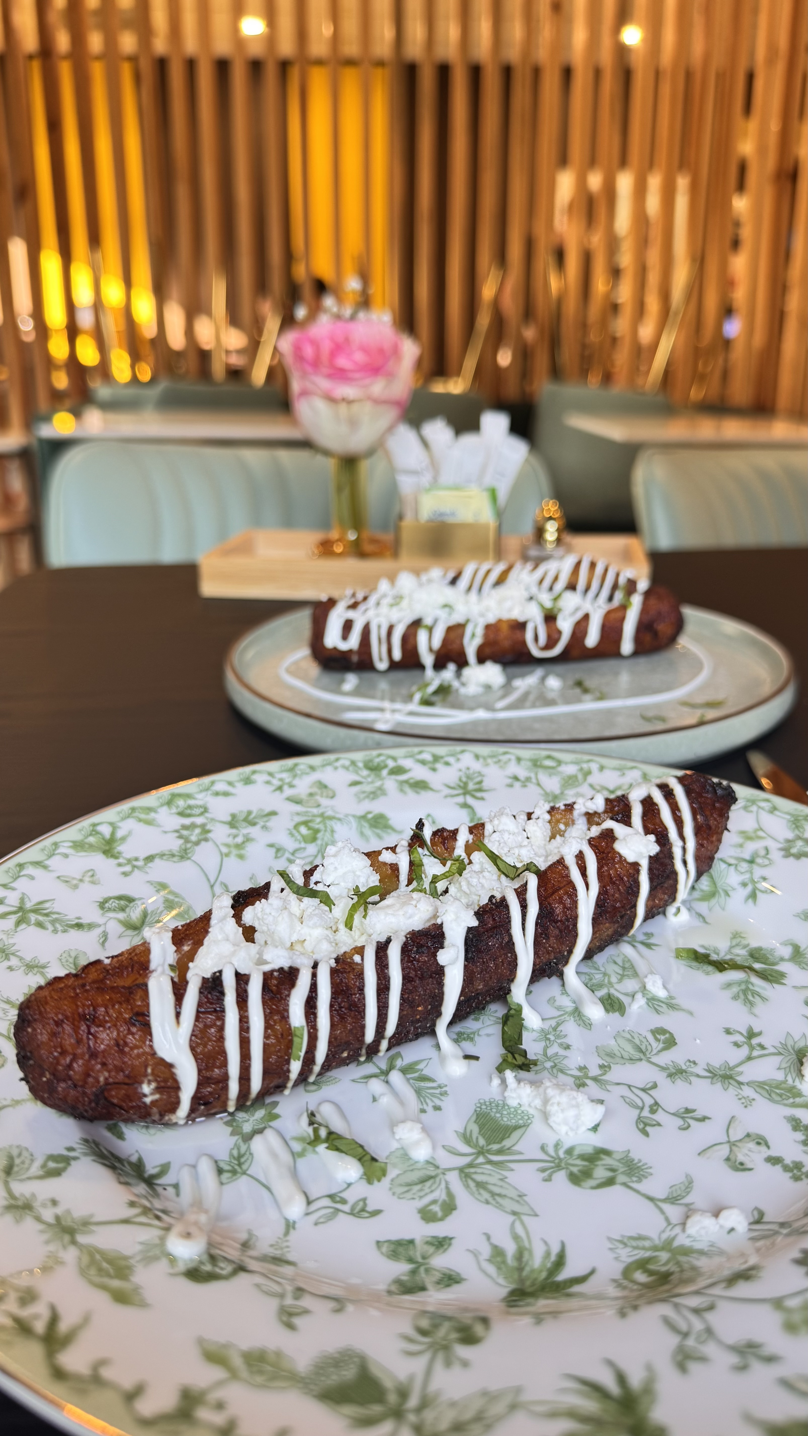 RIPE PLANTAIN WITH  CREMA, FETA AND BEANS